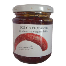 Patè dolce/piccante di peperoncini gr.180 in olio di oliva - Prodotti tipici siciliani Patè dolce/piccante di peperoncini gr.180 in olio di oliva - Prodotti tipici siciliani